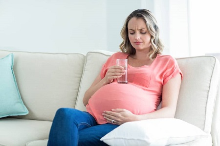 خشکی دهان در بارداری: علائم، علل و درمان