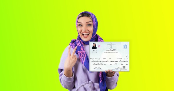A copy of a diploma from a government university is in the hands of a happy young girl